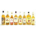 A group of blended Scotch Whisky with manufacturers including Famous Grouse, Sir Edward's, William