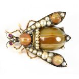 A good late Victorian Scottish insect brooch set with polished agate, seed pearls, diamonds and with