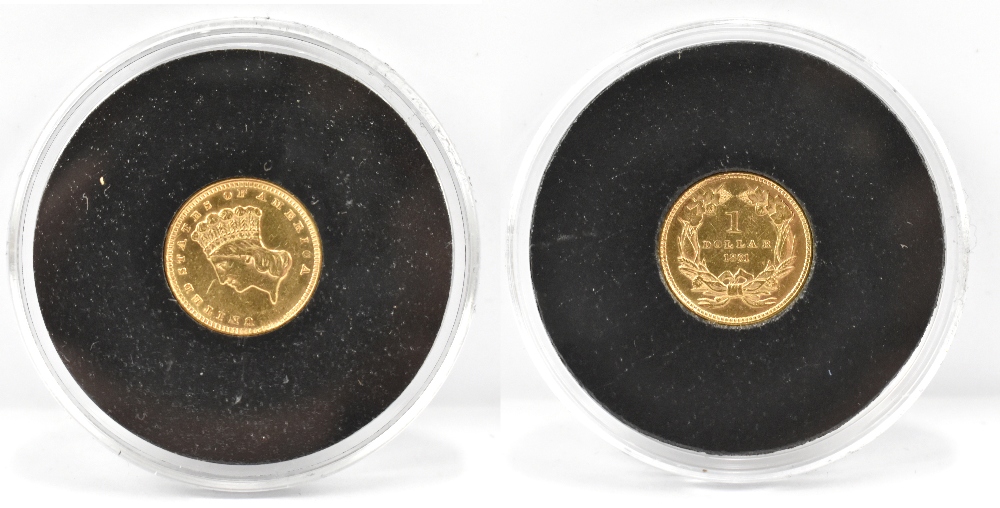 A US 1861 .900 gold dollar, 1.67g, encapsulated with certificate, cased.