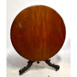 A Victorian mahogany circular breakfast table on turned carved tripod supports, diameter of top