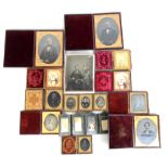 Thirteen assorted late 19th/early 20th century daguerreotype and photographs, part fitted in folding