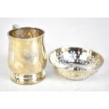 WILLIAM NEALE; a George V hallmarked silver christening mug, engraved initials to front,