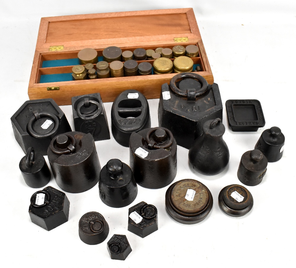 A collection of assorted metal weights including Westminster Bank, hexagonal examples, etc.