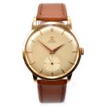 OMEGA; a gentleman's 18ct yellow gold cased automatic wristwatch, the silvered dial set with baton