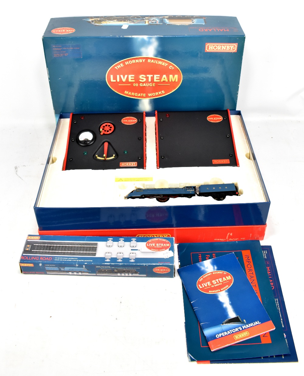 HORNBY; a boxed 'Mallard' live steam 00 gauge set with manual, and a boxed rolling road set.