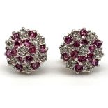 A pair of 9ct yellow and white gold diamond and ruby floral ear studs, approx 1.7g.