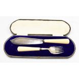 ALLEN & DARWIN; a cased set of George V hallmarked silver ivory handled fish servers, Sheffield