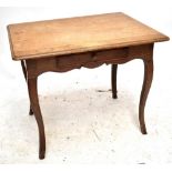 A late 19th century French single drawer oak side table raised on square section cabriole legs.