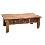 A 19th century oak rectangular coffee table, with three central drawers raised on block supports (