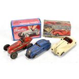 SCHUCO; three vintage clockwork cars, to include Steerable Driving School car, length 13.5cm, '