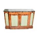 A Victorian walnut breakfront chiffonier with green marble top above two mesh doors flanked by two