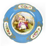 SEVRES; an 19th century cabinet plate painted with a young couple on landscape to the centre and