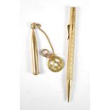 SAMPSON MORDAN; a 9ct yellow gold propelling pencil and a further 9ct yellow gold pencil in gold