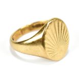 A 9ct gold signet ring, with engraved detail, size P, approx 6g.