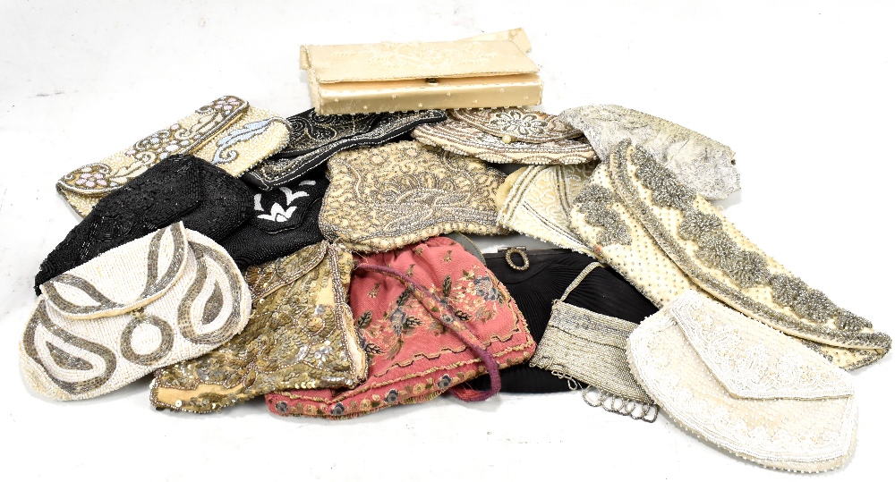 A collection of vintage handbags including beaded examples and embroidered examples.