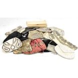 A collection of vintage handbags including beaded examples and embroidered examples.