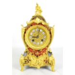 A late 19th century French boulle work mantel clock of typical form, the enamelled dial with Roman