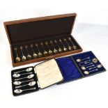 JOHN PINCHES (MEDALLISTS) LTD; a set of twelve hallmarked silver teaspoons produced for the Royal