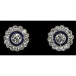 A pair of white metal diamond and sapphire floral stud earrings, estimated diamond weight 2.25cts,