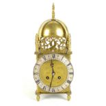 An early 20th century French brass cased lantern clock of typical form, with three pierced brass