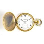 ELGIN; a gold plated full hunter crown wind pocket watch, the white enamel dial inscribed 'Thos.