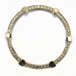 A white gold diamond set watch bezel, diameter 4cm.