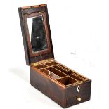 A Georgian inlaid yew wood gentleman's travelling vanity box, the hinged lid enclosing a mirror