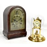 An early 20th century mahogany cased bracket clock, the silvered brass dial with Roman numerals,