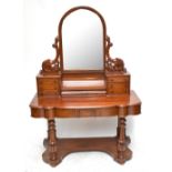 A Victorian mahogany Duchess dressing table of shaped outline with carved detail, approx 170 x