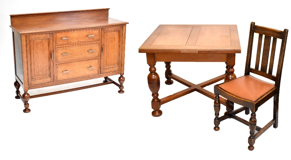 An oak draw leaf table, four chairs and a sideboard.Additional InformationWe will not be providing a