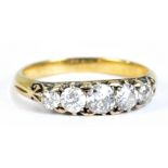 An 18ct yellow gold diamond five stone ring, size I, approx 0.69ct, approx 2.7g.