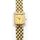 LACHER; a lady's 14ct gold and diamond set wristwatch, the square dial set with Roman batons, approx