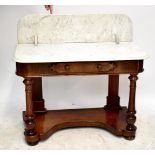 A Victorian mahogany marble topped wash stand, the frieze with single drawer, length 108cm.