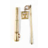 SAMPSON MORDAN & CO; a 9ct yellow gold cigar punch and a 9ct yellow gold swizzle stick with fob
