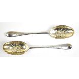 HUGH GORDON; a pair of George II Scottish hallmarked silver tablespoons, later embossed to berry