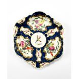 WORCESTER; an 18th century first period hexagonal teapot stand with blue scale ground and