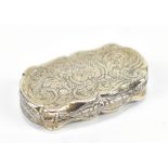 A mid-Victorian hallmarked silver vinaigrette of shaped oval form, with engraved detail and