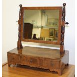 A 19th century mahogany toilet swing mirror with three drawers to base, on bracket feet, 40 x 38cm.