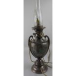 An early 20th century Hinks & Sons Walker & Hall electroplated oil lamp in the Classical style,