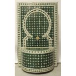 A modern water fountain with green mosaic-type decoration, height 121cm.