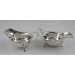 A pair of George V hallmarked silver sauce boats with shaped rims, Emile Viner Ltd, Sheffield 1933,