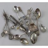 A quantity of hallmarked silver and white metal teaspoons, collectors' spoons, sifting spoons etc,