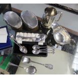 A mixed group of variously hallmarked silver items including sauce boat, mug (af),