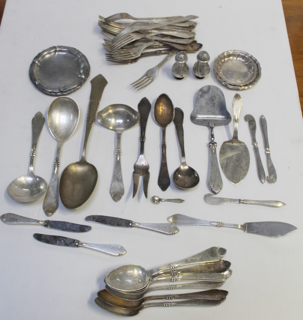 A small group of Danish plated flatware to include knives and forks and four small dishes.