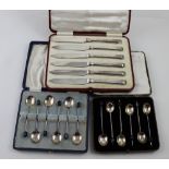 Two George VI hallmarked silver cased set of six coffee bean spoons, Harrison Fisher & Co,