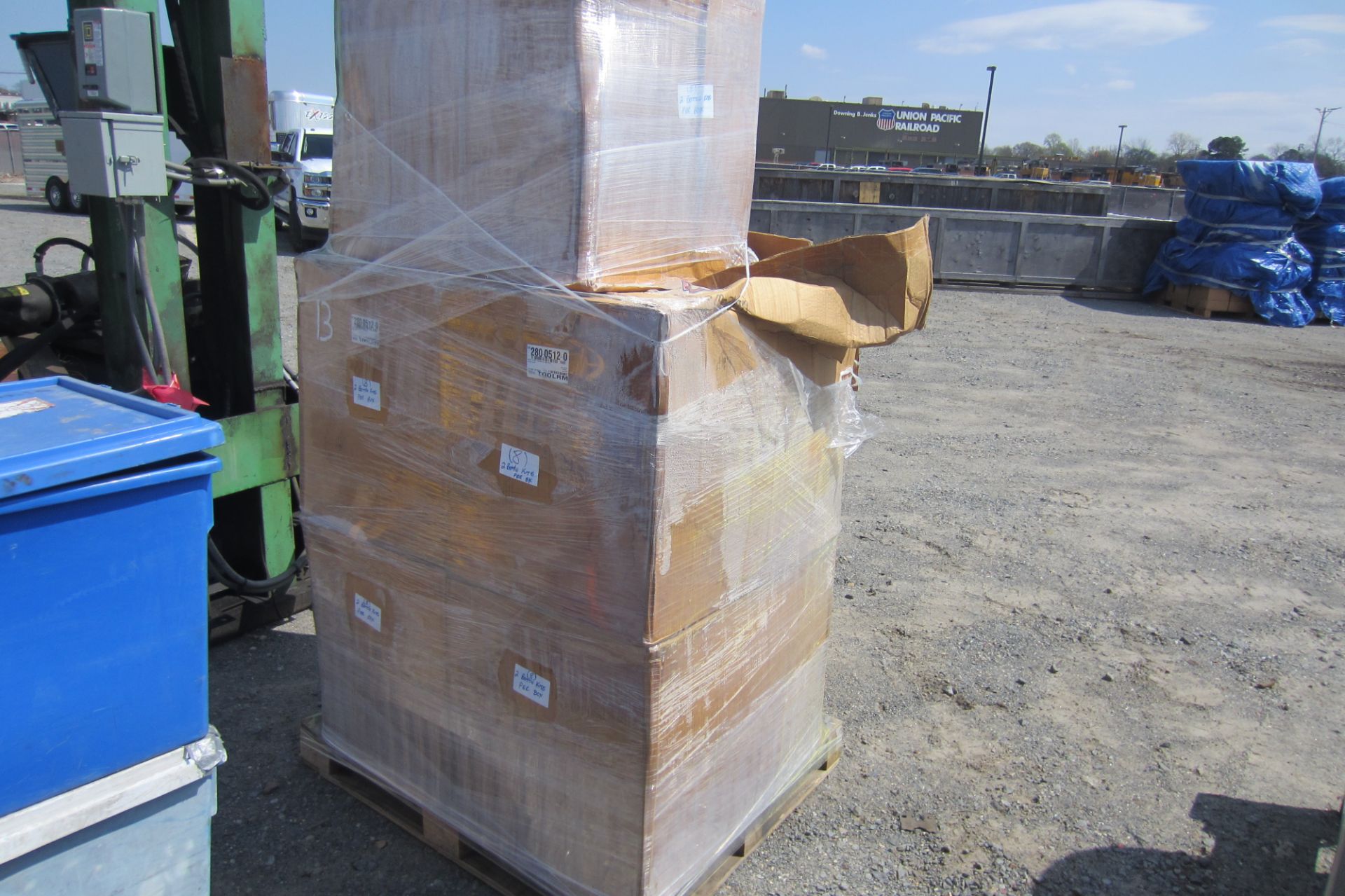 PALLET OF BOXES WITH PLASTIC BOTTLES