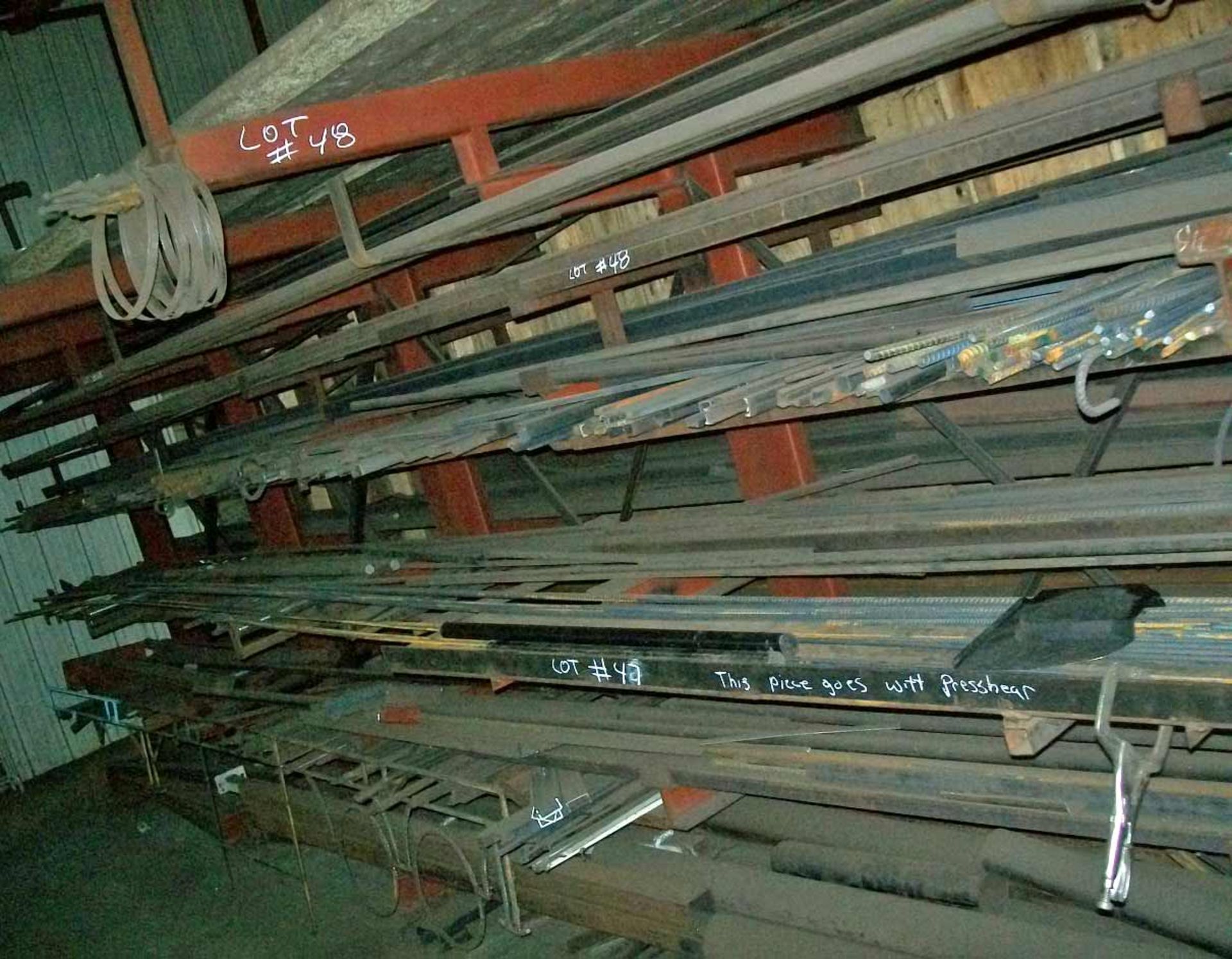 LARGE METAL RACK WITH PIPE, REBAR, ANGLE IRON, TUBE STEEL & MISC