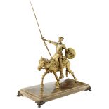 Don QuijoteAnfang 20. Jh. "Don Quijote zu Pferd". Bronze vergoldet. Unsigniert. Sockel aus beige