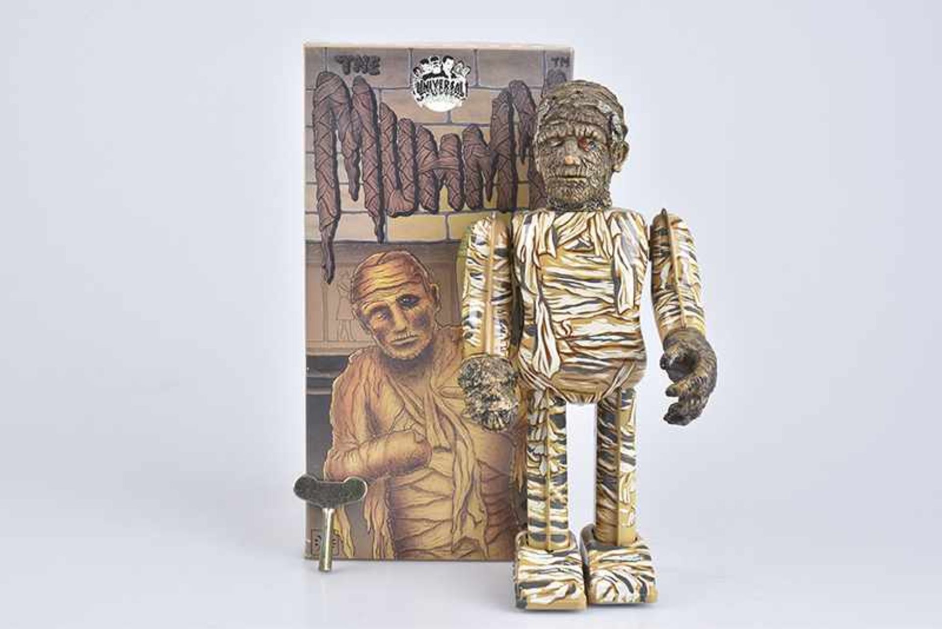 TM The Mummy, Made in Japan, Blech/ Kunststoffkopf, lithographiert, H 22 cm, Uhrwerk ff, Z 1, Okt.