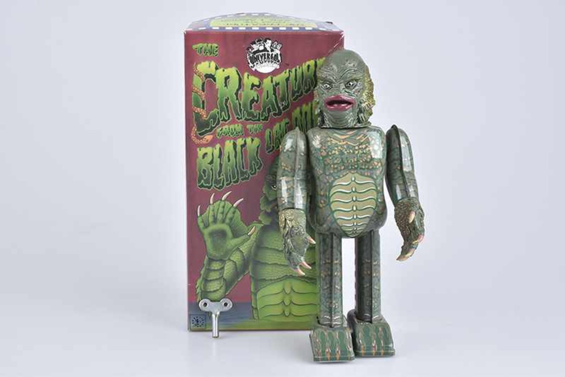 TM Creature from the black Lagoon, Made in Japan, Blech/ Kunststoffkopf, grün/ lithoraphiert, H 23